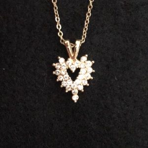 gold heart necklace with inset stones